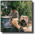 Field workers are baking pitta bread for lunch